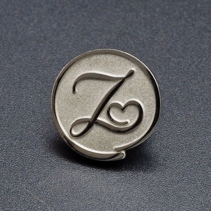 't Zusje Pins in zilver verguldsel