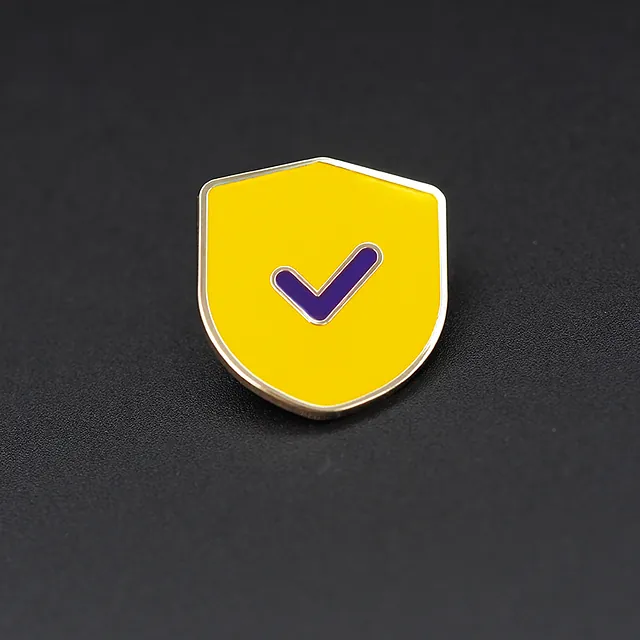 Pins Denk vooruit Ministerie Justitie en veiligheid, schild vormige speld