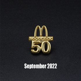 Pins met mcDonalds Logo en 50 