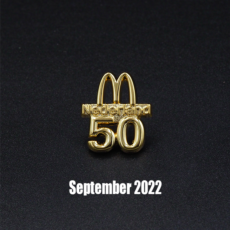 Pins met mcDonalds Logo en 50 