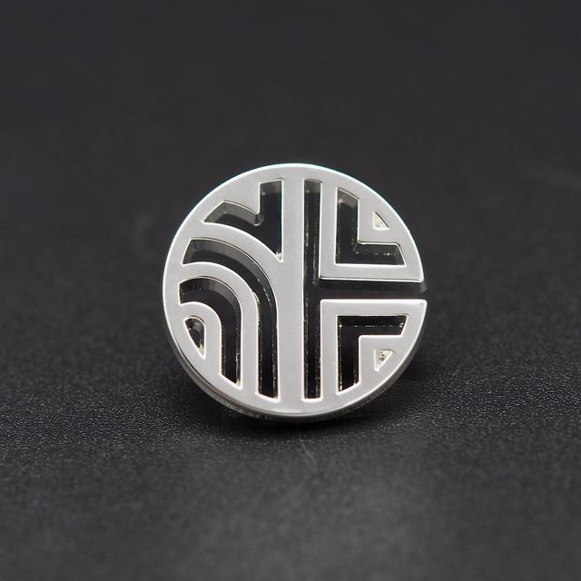 NH Collection Hotels Logo in opengewerkte Pins
